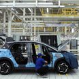Workers assemble an EV car inside BYD's first electric vehicle (EV) factory in Southeast Asia, a fast-growing regional EV market where it has become the dominant player, in Rayong, Thailand, July 4, 2024. REUTERS/Chalinee Thirasupa