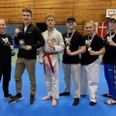 Moo Sa’s kamphold ved Slesvig-Holstein Cup fv: Sanne Jensen, Philip Lykholt, Anton Wulf, Jonas Wulf, Emma Frølunde og Julius Rosendahl. Pressefoto