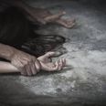Man's hand holding a woman hand for rape and sexual abuse concept, anti-trafficking and stopping violence against women, International Women's Day
