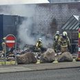 Brandfolkene i Tilst forventer at være færdige på stedet i løbet af søndag formiddag. Foto: Presse-fotos.dk