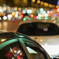 French taxi with the champs elysees avenue in background