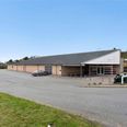 Køberne af den gamle Kiwi har planer om at bygge aktivitetscenter og boliger til seniorer. Foto: EDC