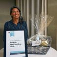 Marie Madsen fra Aarhus Beachvolley Club tog stolt imod prisen som årets forening hos DGI Østjylland. Foto: Cathrina Meyer